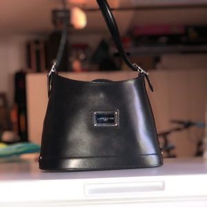 a mini black and pink bag